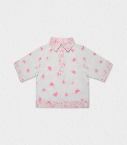 Girls' elegant blouse with intricate embroidery and jacquard fabric.