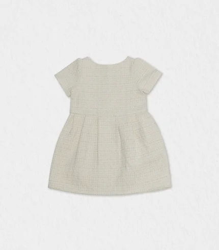 Sophisticated girls tweed dress combining comfort with a polished look